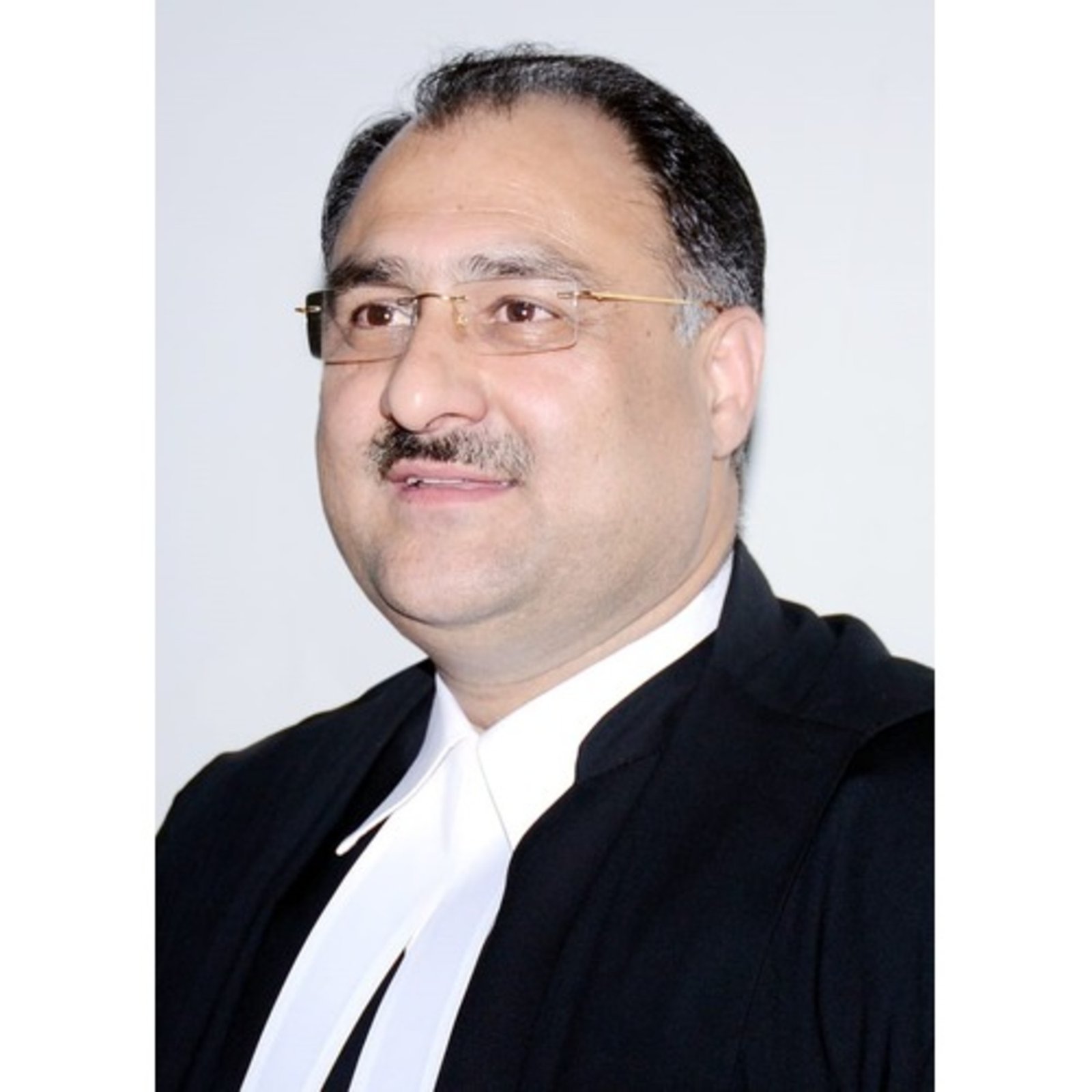 Hon'ble Mr. Justice Attau Rahman Masoodi (Retd.)